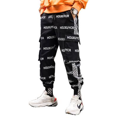 China Custom Anti-wrinkle Fashion Printed Letters New Maching Hip Hop Pants For Men for sale