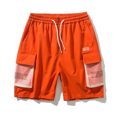 China 2021 New Custom Anti-Wrinkle Polyester Shorts Stereo Pocket Street Shorts Elastic Waist Mens Sports Shorts for sale