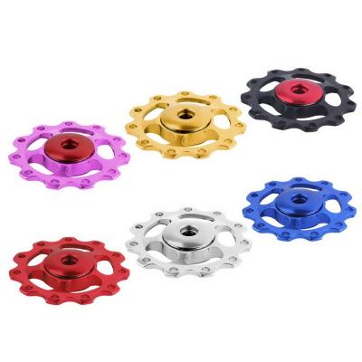 China Aluminum Rear Bike Derailleur Aluminum Rear Derailleur Pulley Wheel MTB Mountain Road Bike Install Part 11T Guide Roller Idler Pulley Component for sale