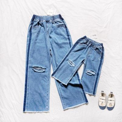 China New Summer Breathable NVFelix Family Matching Pants Stylish Baggy Straight Manufacturer Ripped Side Stripe Mommy And Me Customized Jeans for sale