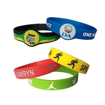 China Wholesale custom logo environmental friendly sports wrist silicon rubber bracelet debossed logo for men for sale