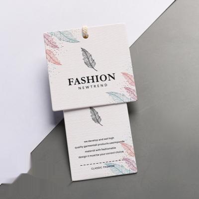 China Viable High End Transparent Swing Hang Tags Designs Custom Paper Logo Bundle Label Tag for sale