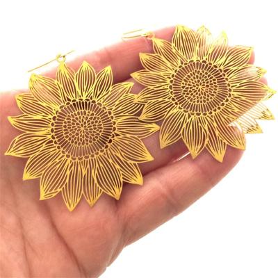 China CLASSIC Bohemian Style Women Jewelry Earrings Gold Hollowed-out Luxury Sunflower Ear Cuff Ear Hook Earrings for sale