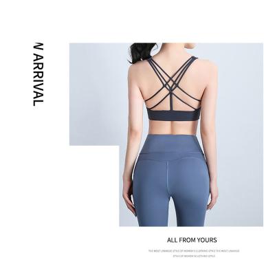 China 2022 Breathable Custom Sexy Cross Back Sports Bra Yoga Sports Bra Yoga Wear Gym Pads Removable for sale