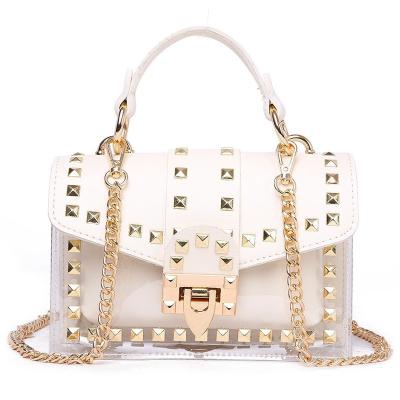 China Fashion Fashion Messenger Bag Chain Female Rivets Clear Square PVC Jelly Bag Shoulder Bag Transparent Handbag for sale