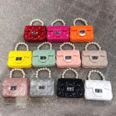 China Cross 2021 - Cute Fashion Designer Brand Bags PVC Jelly Purses Small Pearl Handle Children Handbags Little Girl Body Bag for sale