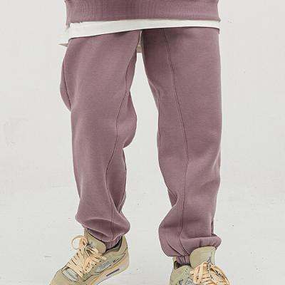 China 2021 QUICK DRY autumn and winter solid color plus velvet package feet sweatpants high street fashion brand sports and leisure long pants for sale