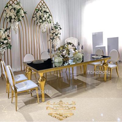 China Luxury new design 12 seater gold stainless steel luxury event dining table with glass for sale