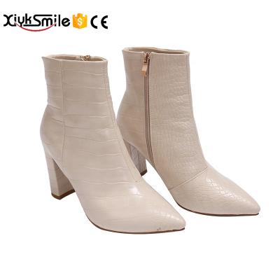 China Insulative square toe thick short tube 2022 stone pattern new retro spring heel ankle boots led toe women's boots women's shoes for sale