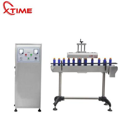 China Food Air Cooled Automatic Induction Sealer Aluminum Foil Sealing Machine for sale