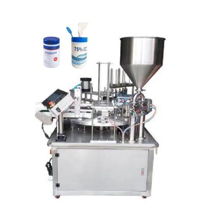 China Food Canister Cloth Machine Rewinding Wet Slot Stuffing Alcohol Filling Capping Labeling Machine for sale