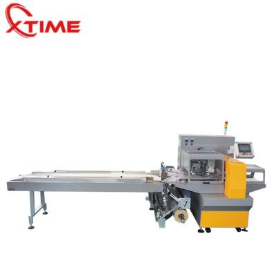 China XTIME Food Packing Machinery High Speed ​​And Quality Pillow Packaging Machine For Packing Vegetables for sale