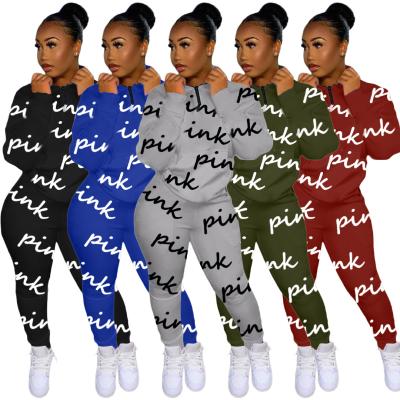 China 2022 Viable New Style Spring Pink Letter Printing Fashion Long Sleeved Two Piece Zipper Casual Women's Jogging Suit for sale