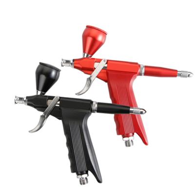 China Single Disassembly 20 Double Action Easy Use Trigger Clean 40 cc Cup High Capacity Airbrush Gun with Hose 0.3mm for sale