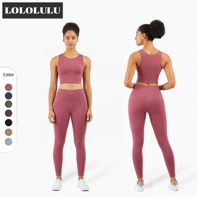 China Breathable Yoga Set 2021 High Stretch Yoga Clothes For Women Sport Set With Removable Cups for sale