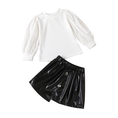 China Casual fall 2021 knit famous brand wholesale famous children's winter boutique skirt outfit girl black white bubble for sale