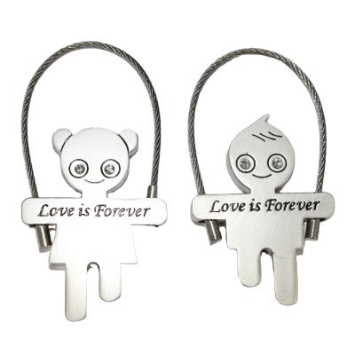 China Metal Jump Rope Child Key Chain Key Chain Boy And Girl Couples Senior Lover To Wedding Souvenir for sale