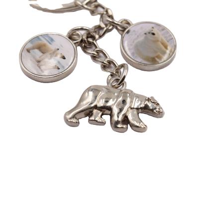 China Custom Metal Bear Key Chain New Fashion 3d Polar Bear Key Chain for sale