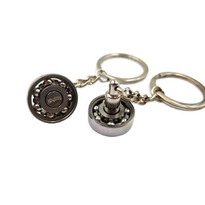 China Hot Sale Fashion Metal Ball Roller Bearing Rotating Key Ring Keychain for sale