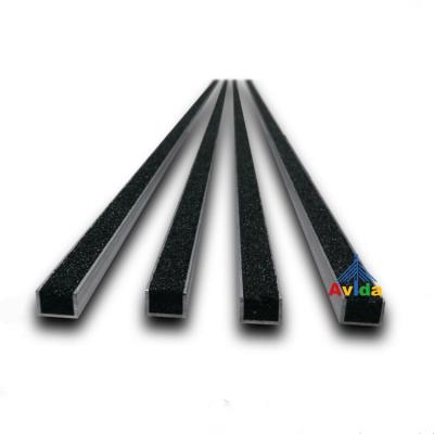 China Exterior / Interior Stair Nosing Oman Inserted Carborundum Stair Nosing Strips For Concrete Staircase for sale