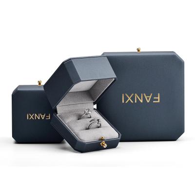 China Custom Octagonal Dark Gray Leather Jewelry Packaging Box FANXI Package FANXI Shape Button Shape Button Jewelry Box With Logo for sale