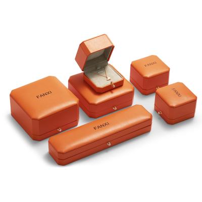 China Jewelry Package FANXI Luxury Custom Orange PU Leather Jewelry Box With Gold Stamp Logo Ring Earrings Necklace Bracelet Jewelry Packaging for sale