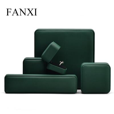 China Wholesale Custom Top Green Jewelry Package FANXI Sales FANXI Leather Jewelry Ring Packaging Box With Logo for sale