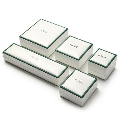 China White Leather And Velvet Jewelry Packaging FANXI Simple Jewelry Packaging PU And Couple Wedding Ring Box for sale