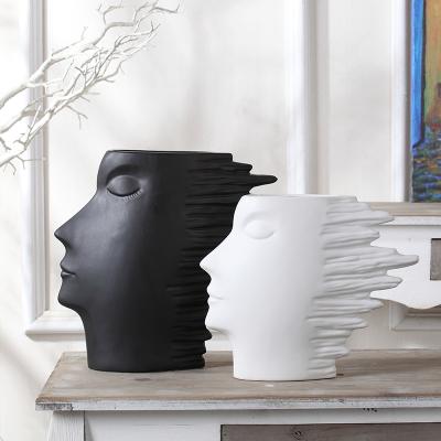 China Minimalist Creative Black And White Home Decor Human Face Illustration Nordic Modern Ceramic Vase for sale