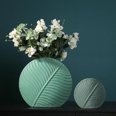 China Minimalist Creative Leave Shape Vase Nordic Modern Tabletop Home Decor Ceramic Flower Vase for sale