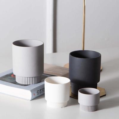 China Empty Candle Cup Fancy Porcelain Candle Container Cylinder Candle Jars Matte Black Ceramic Candle Holder for sale