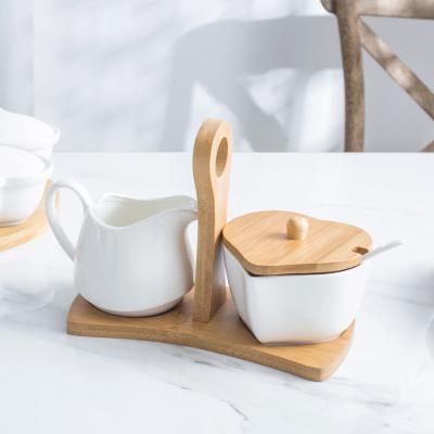 China Nordic White Ceramic Porcelain Stocked Milk Coffee Jug Sugar Bowl and Creamer Pot Set with Bamboo Tray for sale