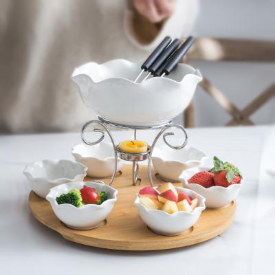 China Viable White Ceramic Snack Tray Cheese Melting Pot Porcelain Chocolate Fondue Set With Forks And Iron Bracket for sale