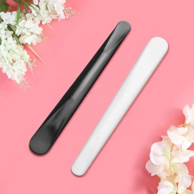 China Flat Brush Cosmetic Black Spatula For Makeup Face Mask Plastic Spoon Disposable Makeup Tools for sale