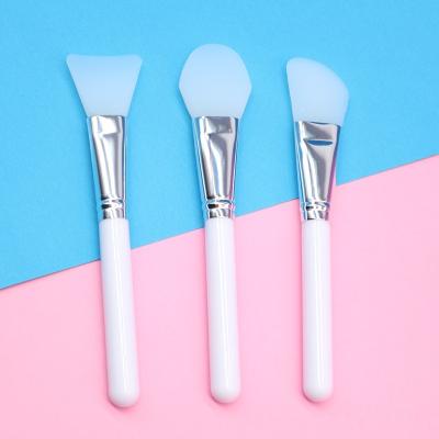 China Angular Blush New Arrival Long Handle Women Silicone Face Mask Brush Makeup Tools Facial Mud Blending Applicator for sale