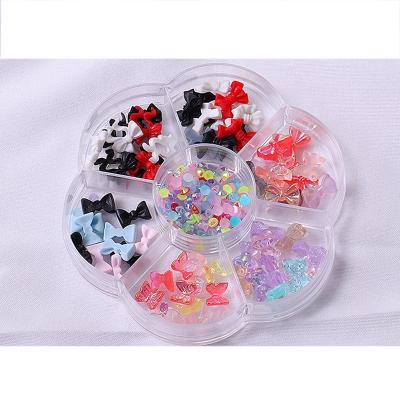 China QGMH-005 Aurora Colorful Crystal Butterfly Bow 3d Nail Jewelry Summer Shinning Semi Transparent Butterflies Charm Nail Art Decorations for sale