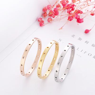 China FASHIONABLE Full Circle Hollow Star Titanium Steel Women's Fashion Round Non-fading Gold Plated Five-pointed Open Bangle Bracelet for sale