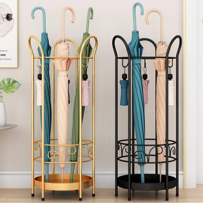 China Umbrella Holder Stainless Steel Umbrella Holder Viable Hanging Rack Gold Door Storage Holder for sale