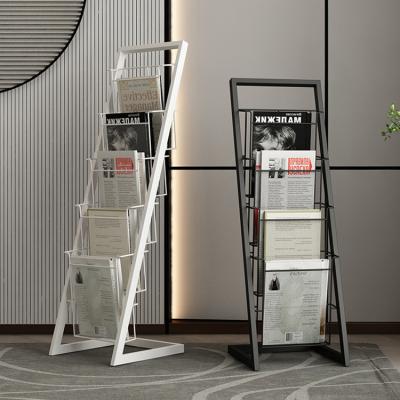 China Sustainable Newspaper Wrought Iron Display Rack Magazine Books Indoor Multilayer Floor Storage Rack for sale