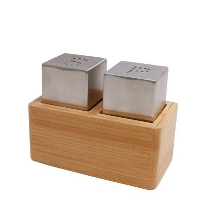 China Sustainable bamboo rack with stainless steel salt and pepper pot for sale