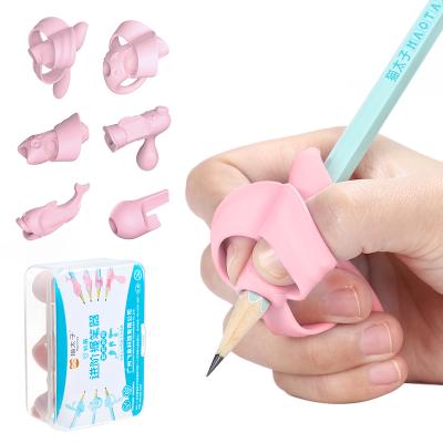 China Correct Writing for Child Silicone Posture Corrector Pencil Grips For Children Soft Writing for sale