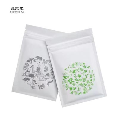 China Customized White Color Zipper Lock Packaging Bag Customized Logo Aluminum Foil Tea Packing Bags for sale