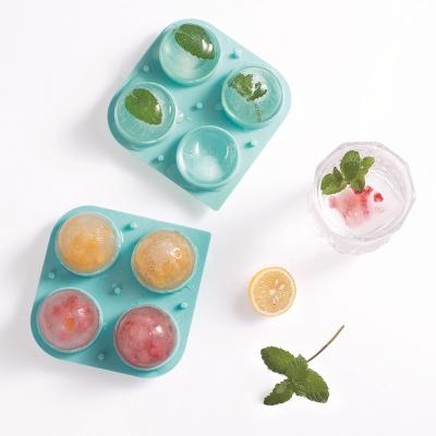 China Viable 4 Cavity Diy Cube Maker Colorful Ice Cubes Mold Silicone Whiskey Ball Round Ice Trays for sale