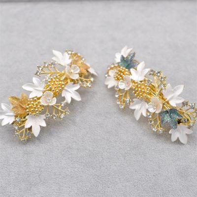 China Wholesale High Quality RedWillow Female Hair Tiara Gold Hair Pin Flower Shape Hand Painted Tiara Decoration Wedding Accessories for sale