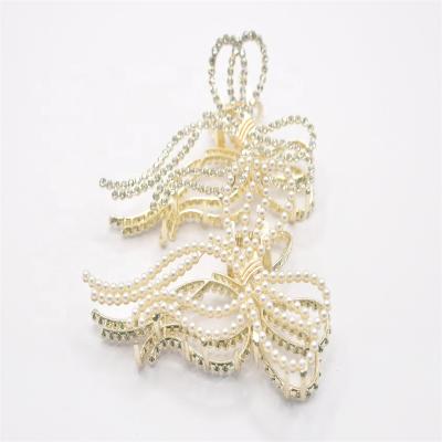 China 2022 New Vintage Decoration Korean Fashion High Quality Creative Gold Elegant Pearl Rhinestone Hair Claw Clips Metal Hair Claw for sale