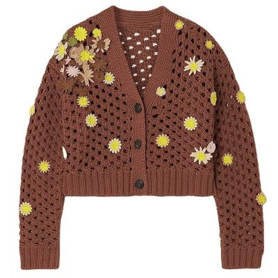 China custom crochet Anti-wrinkle ug women sweater winter hollow out hand knitwear sweater cardigan crochet sweater women for sale