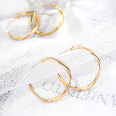 China Fashion TRENDY Design Big Simple Gold Hoop Clip On Circle Earrings C Shape Twisted Matte Gold Hoop Earring For Lady Of Earrings for sale