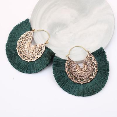 China New Design Fashion Cavity Alloy Wire Tassel Circle Earrings Female Helix Shape Hypoallergenic TRENDY Jewelry Retro Dangle Earrings for sale