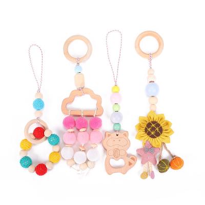 China Baby Toys 4PCS/SET Baby Teether Baby Stroller Pacifier Chain Pram Rattle Pram Clip Chewable Hanging Hook Beads Wooden Animal Care Pendant Toy for sale