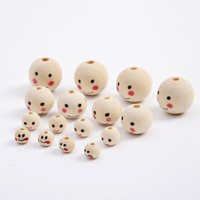 China Eco-Friendly Smiley Face Natural Wood Beads Handmade Ball Around Loose Spacer Beads For Jewelry Making Diy Bracelet Accessories for sale